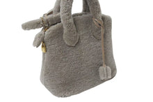 Load image into Gallery viewer, 新品同様 LOUIS VUITTON ルイヴィトン 2011AW ロックイット ヴォワヤージュ M93850 ムートン レザー グリペルル ゴールド金具 中古 4b001189