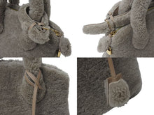 Load image into Gallery viewer, 新品同様 LOUIS VUITTON ルイヴィトン 2011AW ロックイット ヴォワヤージュ M93850 ムートン レザー グリペルル ゴールド金具 中古 4b001189