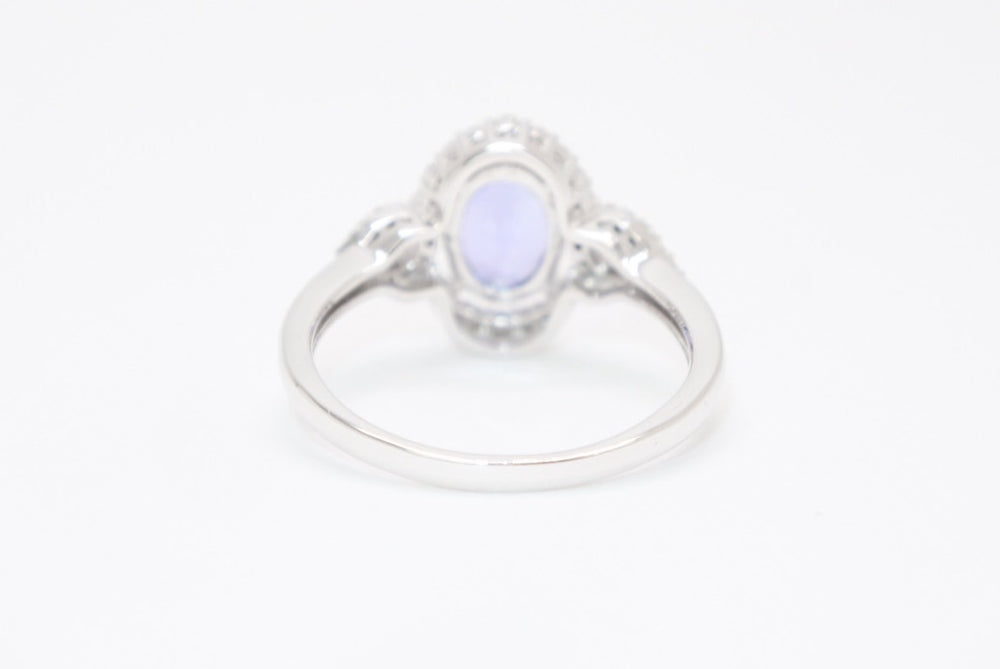 New and unused K18 white gold ring Tanzanite mele diamond 1.0ct 0.22ct Weight approx. 3.50g K18WG stamp Size 13 Used 4b013449