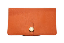 Load image into Gallery viewer, 極美品 HERMES エルメス 二つ折り財布 長財布 ドゴンMM トリヨンクレマンス 刻印不鮮明 オレンジ ゴールド金具 中古 4b012827