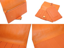 Load image into Gallery viewer, 極美品 HERMES エルメス 二つ折り財布 長財布 ドゴンMM トリヨンクレマンス 刻印不鮮明 オレンジ ゴールド金具 中古 4b012827