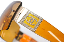 Load image into Gallery viewer, 極美品 CHANEL シャネル リムレス サングラス 4095-B c.125/7F サイズ62□15 125 ココマーク ラインストーン クリアオレンジ 中古 4b002220