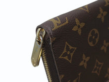 Load image into Gallery viewer, LOUIS VUITTON ルイヴィトン モノグラム ジッピーウォレット 長財布 M42616 ブラウン フューシャ ゴールド金具 美品 中古 4b002916
