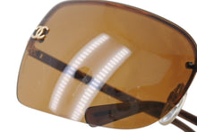 Load image into Gallery viewer, CHANEL シャネル リムレス サングラス 4112 c.125/73 サイズ65◻︎16 120 ココマーク ブラウン メタル レザー 良品 中古 4b002926