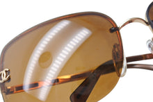 Load image into Gallery viewer, CHANEL シャネル リムレス サングラス 4112 c.125/73 サイズ65◻︎16 120 ココマーク ブラウン メタル レザー 良品 中古 4b002926