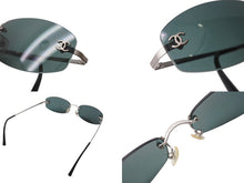 Load image into Gallery viewer, CHANEL シャネル リムレス ココマーク サングラス グリーン プラスチック メタル ロゴ 54☐19 4002 シルバー金具 美品 中古 4b003940