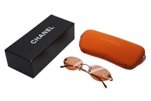 画像をギャラリービューアに読み込む, CHANEL シャネル リムレス ココマーク サングラス オレンジ プラスチック メタル ロゴ 53☐19 4003 ブロンズ金具 美品 中古 4b003962