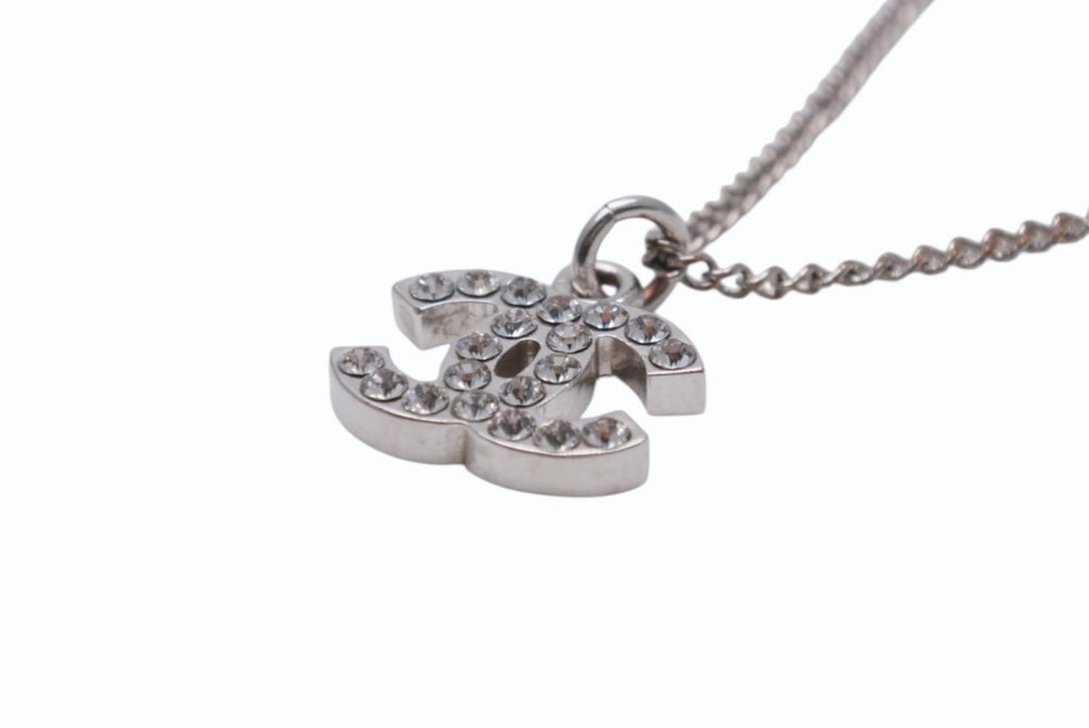 Very Good Condition CHANEL Coco Mark Necklace Rhinestone Accessory 06V Engraved Metal Silver 4g Used 4b003942