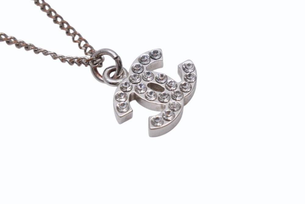 Very Good Condition CHANEL Coco Mark Necklace Rhinestone Accessory 06V Engraved Metal Silver 4g Used 4b003942