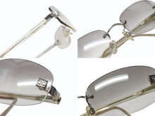 Load image into Gallery viewer, CHANEL シャネル リムレス サングラス サイズ57◻︎18 130 ココマーク メタル プラスチック グレー シルバー 美品 中古 4b004897