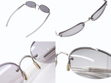 画像をギャラリービューアに読み込む, PRADA プラダ サングラス メガネ SPR 93A イタリア製 プラスチック メタル クリア グレー シルバー金具 美品 中古 4b005004
