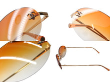 Load image into Gallery viewer, CHANEL シャネル ココマーク リムレス サングラス 4013 GP オレンジ ゴールド金具 サイズ59◻︎16 130 美品 中古 4b005035
