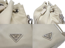 画像をギャラリービューアに読み込む, 極美品 PRADA プラダ ハンドバッグ 巾着型 ロゴプレート Re-Nylon ポーチ 1NS369 ナイロン ベージュ 中古 4b005304