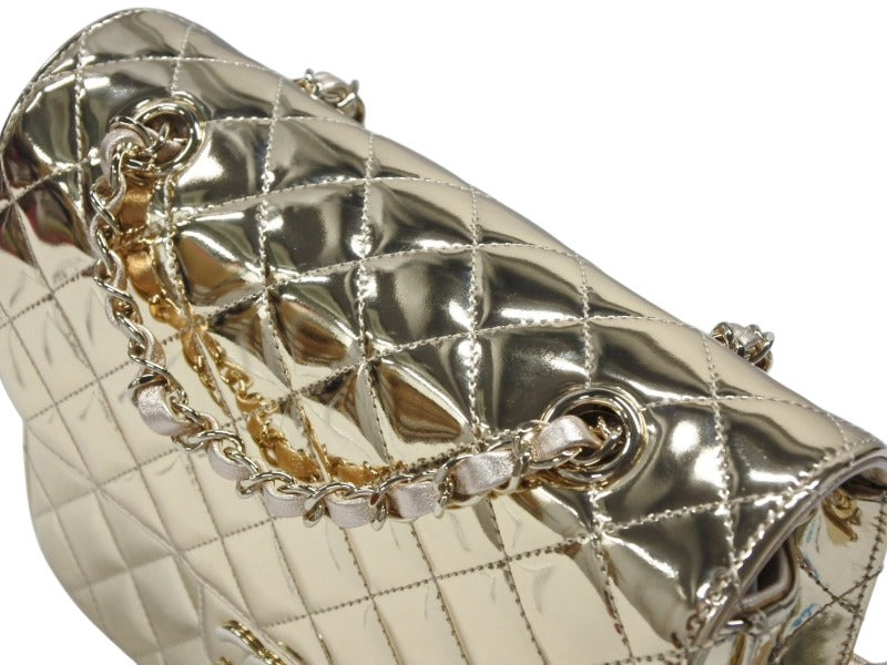 Unused CHANEL Matelasse patent leather chain backpack gold random plate AS4649 gold hardware used 4b007708