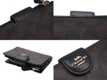 画像をギャラリービューアに読み込む, COACH コーチ シグネチャー 二つ折り財布 C0082 ブラウン ブラック PVC レザー ゴールド金具 美品 中古 4b008062