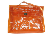 画像をギャラリービューアに読み込む, HERMES エルメス ビニールケリー 不思議の国 エルメスへの旅展 ハンドバッグ トートバッグ オレンジ クリア 透明 ビニール ゴールド金具 美品 中古 4b008241