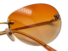 画像をギャラリービューアに読み込む, CHANEL シャネル リムレス サングラス 4013 c.125/56 サイズ59□16 130 ココマーク オレンジ ゴールド 良品 中古 4b009484