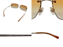 画像をギャラリービューアに読み込む, CHANEL シャネル リムレス サングラス 4017-D c.125/56 サイズ62◻︎17 120 ココマーク ラインストーン オレンジ 美品 中古 4b009805
