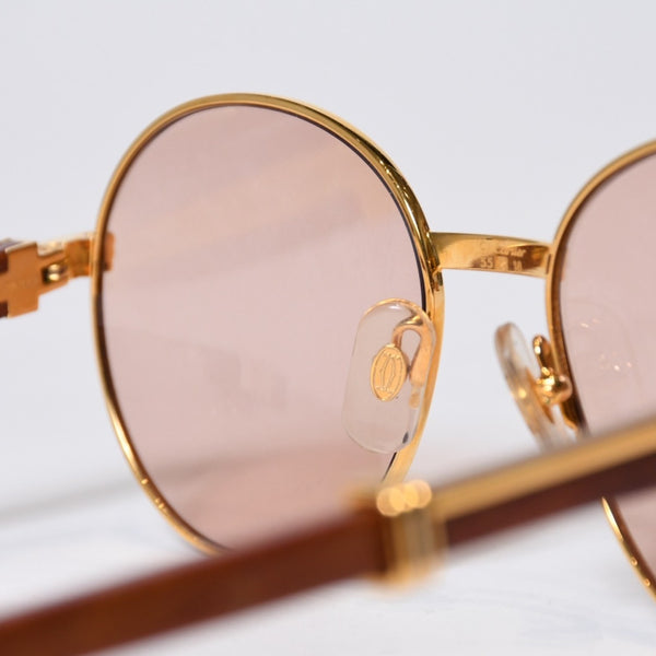 極美品 CARTIER カルティエ オーバル サングラス アイウェア サイズ 55□18 135b トリニティ ウッドテンプル ゴールド 中古 4b013652