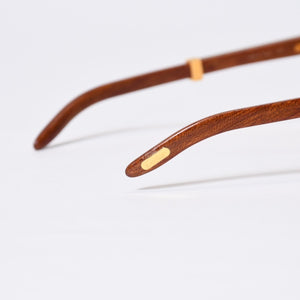極美品 CARTIER カルティエ オーバル サングラス アイウェア サイズ 55□18 135b トリニティ ウッドテンプル ゴールド 中古 4b013652