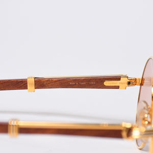 極美品 CARTIER カルティエ オーバル サングラス アイウェア サイズ 55□18 135b トリニティ ウッドテンプル ゴールド 中古 4b013652