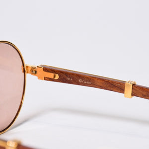 極美品 CARTIER カルティエ オーバル サングラス アイウェア サイズ 55□18 135b トリニティ ウッドテンプル ゴールド 中古 4b013652