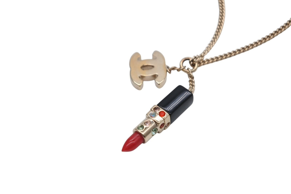 Very Good Condition CHANEL Lip Necklace Accessory 04A Engraved 7g Metal Rhinestone Black Red Gold Hardware Used 4c073928