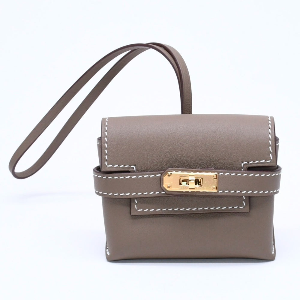 New and unused HERMES Kelly Festival Swift Etoupe Charm Keychain K engraved Used 4a005021