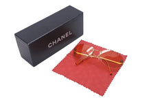 Load image into Gallery viewer, CHANEL シャネル ココマーク サングラス メガネ リムレス グラデーション イタリア製 メタル オレンジ ゴールド 美品 中古 4c068922