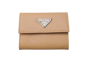 PRADA プラダ 二つ折りコインケース トライアングルロゴ サフィアーノレザー ベージュ シルバー金具 美品 中古 4c073653