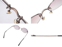 Load image into Gallery viewer, 新品同様 CHANEL シャネル ココマーク サングラス メガネ アイウェア イタリア製 メタル ピンクゴールド金具 ピンク 中古 4c074127