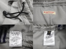 Load image into Gallery viewer, 極美品 KAPITAL キャピタル K2410LP073 スムースジャージー スタントマン&amp;ウーマン スーパーバギートラックパンツ バナーストライプ グレー サイズ1 中古 50588