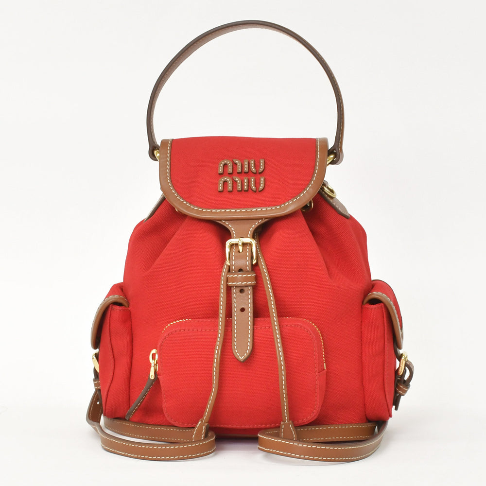 新品同様品 MIU MIU ミュウミュウ キャンバス レザー バックパック レッド ブラウン ゴールド金具 5BZ043 中古 4a005099