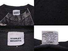 画像をギャラリービューアに読み込む, STANLEY DESANTIS スタンリーデサンティス オズの魔法使い 半袖Ｔシャツ カカシ ロゴTシャツ ブラック 美品 中古 54041