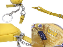 Load image into Gallery viewer, PRADA プラダ ポーチ トライアングルプレート Re Nylon ネックストラップ付 イエロー 2TT140 シルバー金具 美品 中古 55940