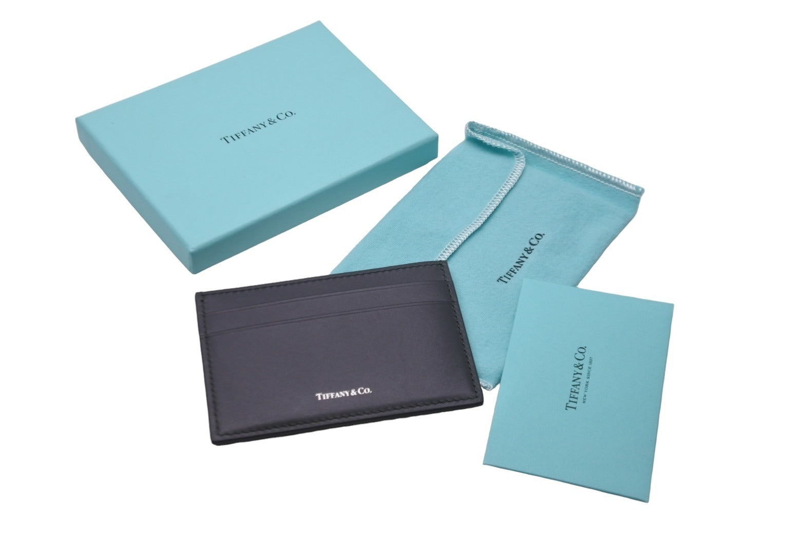 新品同様 TIFFANY&Co. ティファニー カードケース パスケース 定期入れ グレー チャコール レザー 5ポケット 中古 59530 –  Casanova Vintage