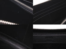 Load image into Gallery viewer, PRADA プラダ 長財布 ラウンドファスナー スタッズ ブラック レザー 1M0506 シルバー金具 美品 中古 59888