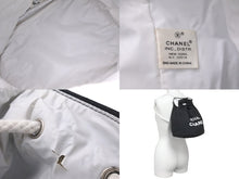 画像をギャラリービューアに読み込む, CHANEL シャネル リュック デイパック キャンバス SOLEIL CHANEL ロゴ 巾着 ノベルティ ブラック ホワイト 良品 中古 60485