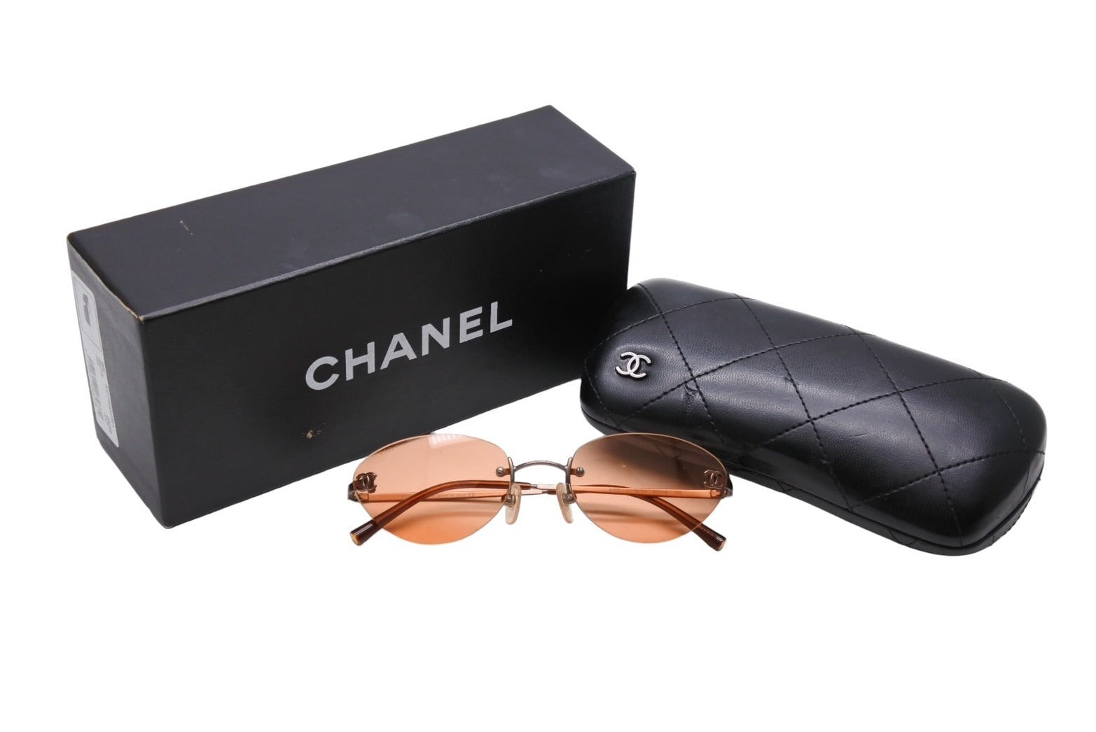 CHANEL シャネル サングラス 眼鏡 ココマーク リムレス 4003 サイズ53□19 130 オレンジ 美品 中古 65282 –  Casanova Vintage