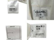 画像をギャラリービューアに読み込む, CHANEL シャネル 半袖シャツ ココボタン ショート丈 ロゴ P61148V38915 コットン ホワイト ブラック サイズ34 美品 中古 65814