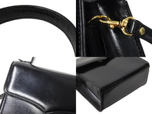 Load image into Gallery viewer, YVES SAINT LAURENT イヴ サンローラン ハンドバッグ 台形型 YSL ロゴ チャーム付き レザー ゴールド金具 ブラック 美品 中古 67291