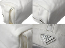 画像をギャラリービューアに読み込む, PRADA プラダ ポーチ ミニハンドバッグ トライアングルロゴ イタリア製 キャンバス ホワイト シルバー金具 美品 中古 4c068318