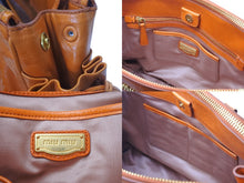 Load image into Gallery viewer, MIUMIU ミュウミュウ ハンドバッグ 2WAY ショルダーバッグ ダブルジッパー オレンジ レザー RN0894 ゴールド金具 美品 中古 4c076219