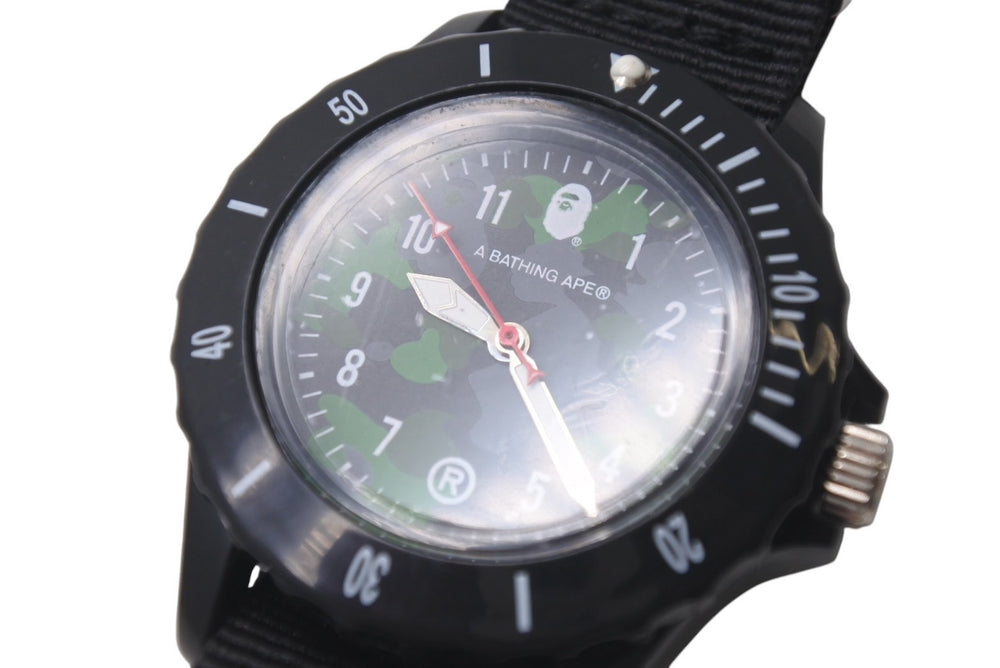 Very good condition A BATHING APE wristwatch rotating bezel camouflage pattern black green silver hardware used 4c076255