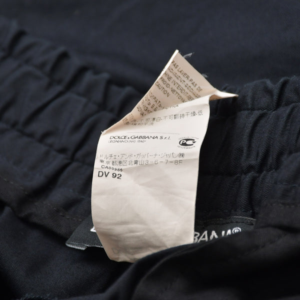 極美品 DOLCE&GABBANA ドルチェアンドガッバーナ ドローストリングジップポケット付きイージーパンツ B06665 H 48サイズ ブラック ブラックメタル金具 中古 4a007841