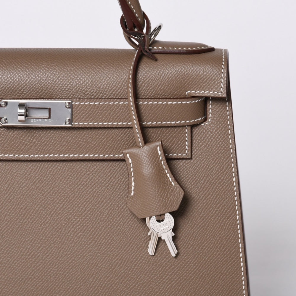 新品未使用 HERMES エルメス ケリー28 外縫い エトゥープ B刻印 ヴォーエプソン シルバー金具 ハンドバッグ 中古 4a001067
