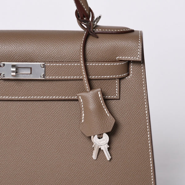 新品未使用 HERMES エルメス ケリー28 外縫い エトゥープ B刻印 ヴォーエプソン シルバー金具 ハンドバッグ 中古 4a001067