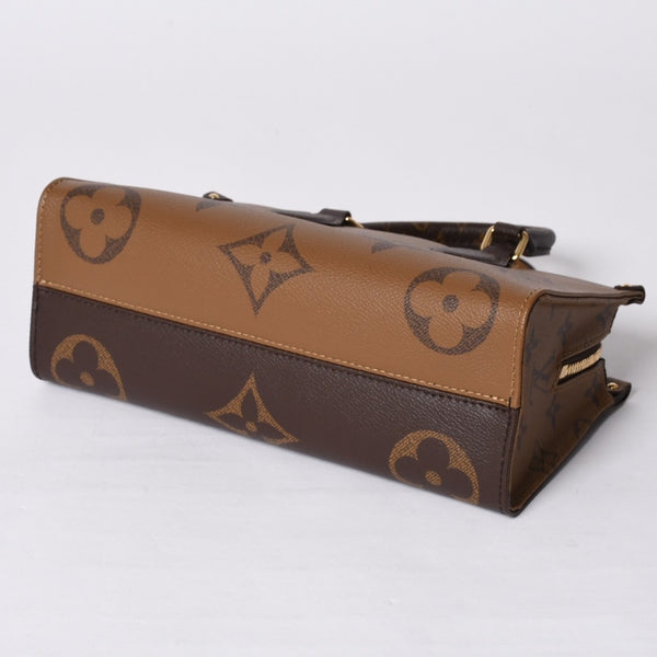 New and unused LOUIS VUITTON On the Go EW 2WAY bag M46653 Monogram Giant Reverse Brown Used 4a000739
