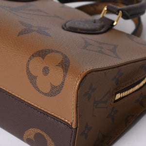 New and unused LOUIS VUITTON On the Go EW 2WAY bag M46653 Monogram Giant Reverse Brown Used 4a000739