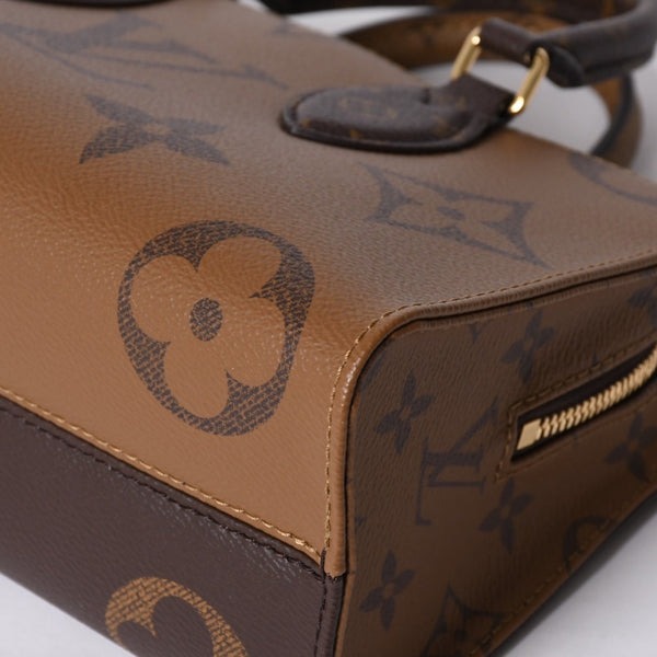 New and unused LOUIS VUITTON On the Go EW 2WAY bag M46653 Monogram Giant Reverse Brown Used 4a000739